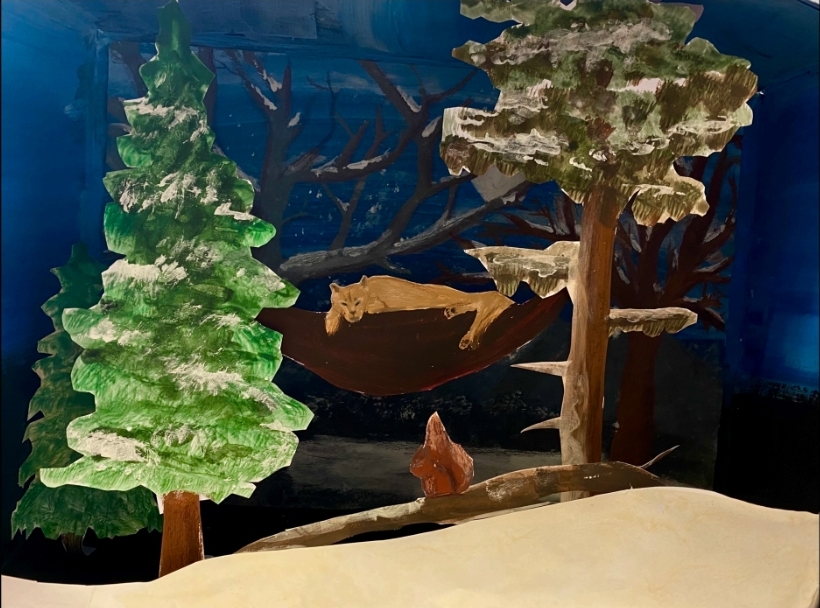 Mixed Media einer Landschaft mit Raubkatze in einer Hängematte von Lea Hero (8c), November 2023.